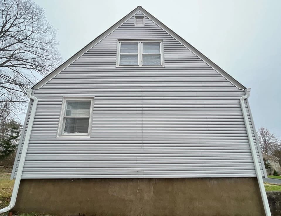 Parma Heights Power Washing technician performing detailed house washing in Parma Heights residential area